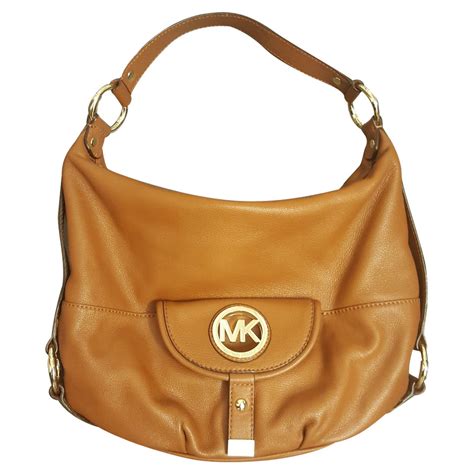 pawn michael kors purse near me|Michael Kors handbags second hand.